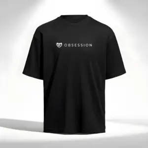 Black Kolossal Obsession loose fit gym t-shirt with minimalist white Obsession chest print on a clean light studio background. Premium oversized athletic shirt designed for hybrid training and modern streetwear aesthetics.
