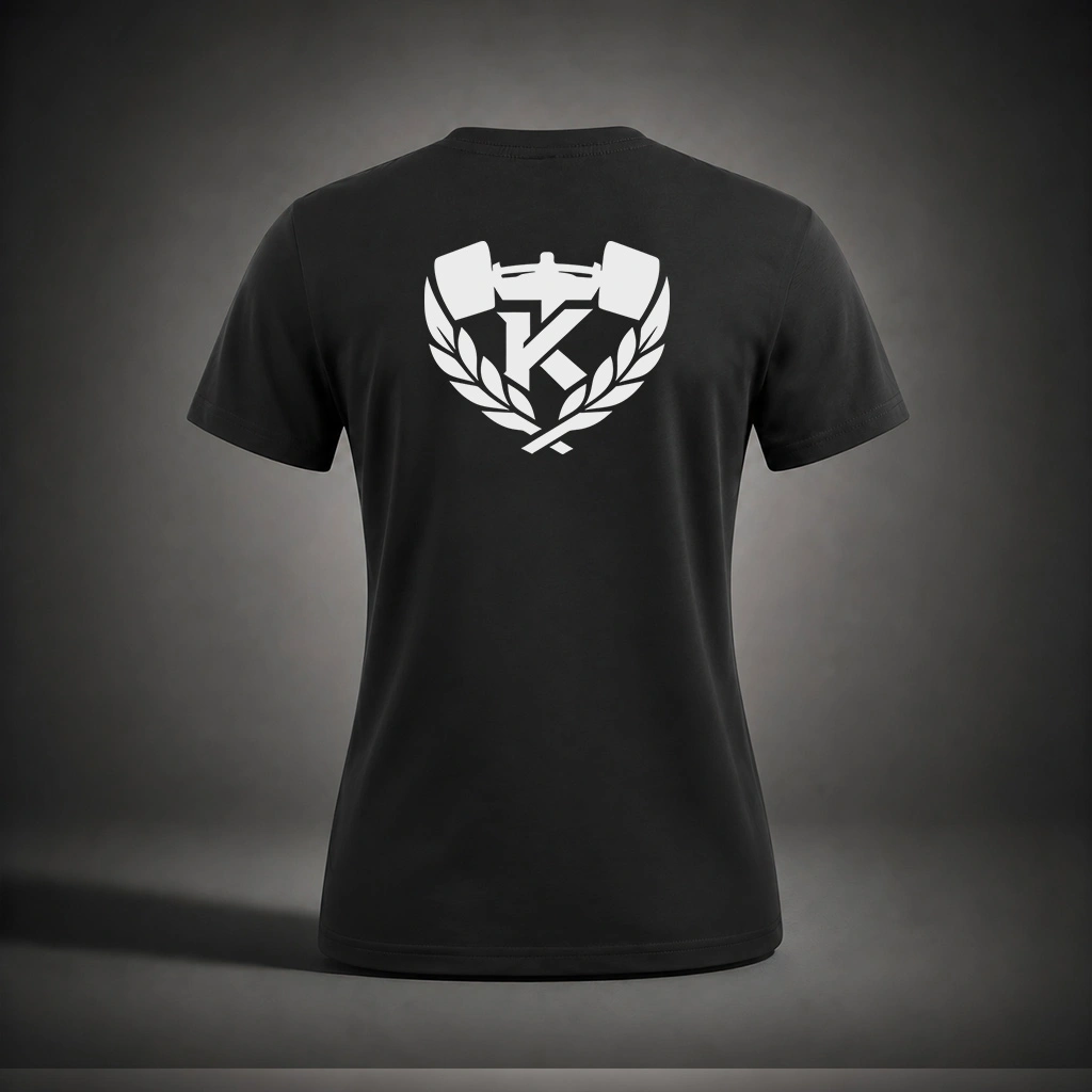 Back view of the Kolossal Core Regular Women's T-Shirt featuring the iconic oversized Kolossal crest on premium black 180 GSM fabric.