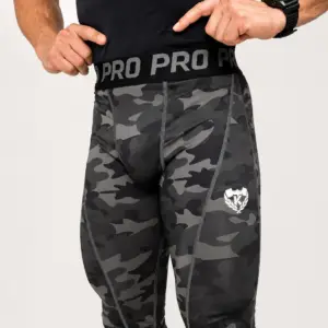 Men's Kolossal Tactical Compression Leggings featuring a dark camo compression fit.